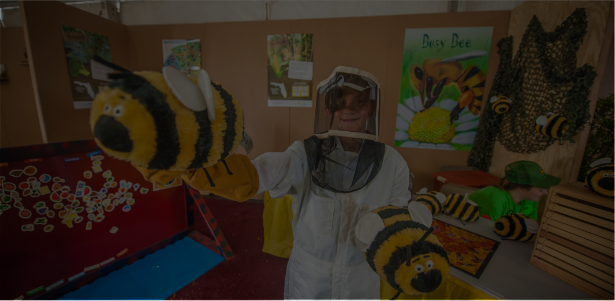 Bee Keeper with Stuffed Bees